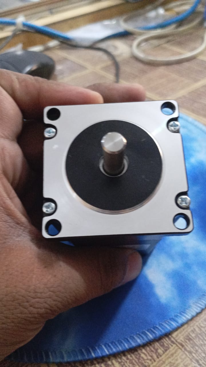 Brand New High Quality 57BYGH76 NEMA 23 Bipolar Stepper Motor 76mm 4.0A 1.8nm - a close-up of the square silver front face, the central rotating shaft, and four mounting holes.