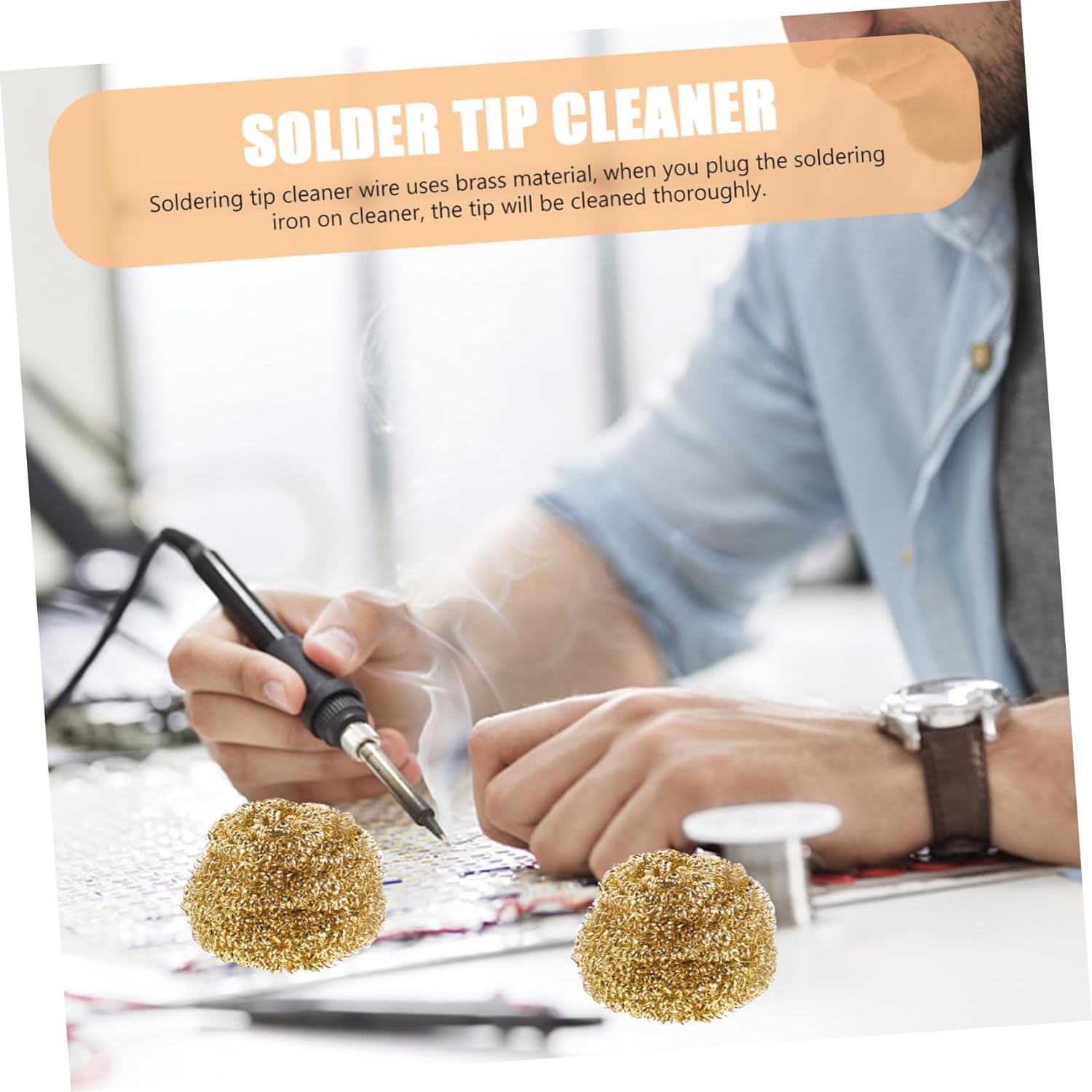 Brass Wire Sponge Soldering Iron Tip Cleaner with Metal Tin Box - two gold-coloured spherical brass wire sponges placed in front of a person using a soldering iron.