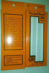 Breadboard Project Board Gl No 12 - shown in its orange retail packaging, featuring a white breadboard visible through a cutout on the front of the box.