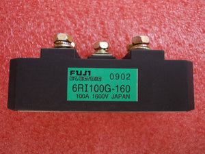 Bridge Rectifier Module 6RI100G-160 100A-1600V Fuji - a black rectangular electronic component with three metal screw terminals and a green label.