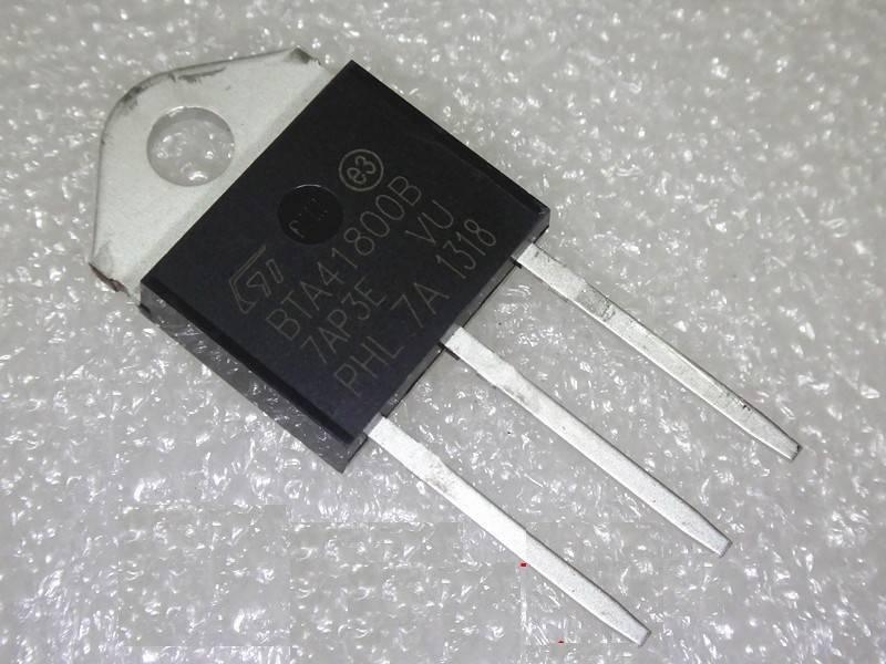 BTA41800 High Power Thyristor - a black three-pin electronic component with a metal mounting tab, shown in a close-up against a bubble wrap background.