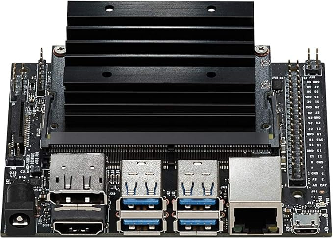 Buy Nvidia Jetson Nano 4GB Developer Kit B01 - a black heatsink, USB ports, Ethernet port, HDMI port, power jack, and GPIO pins on a circuit board.