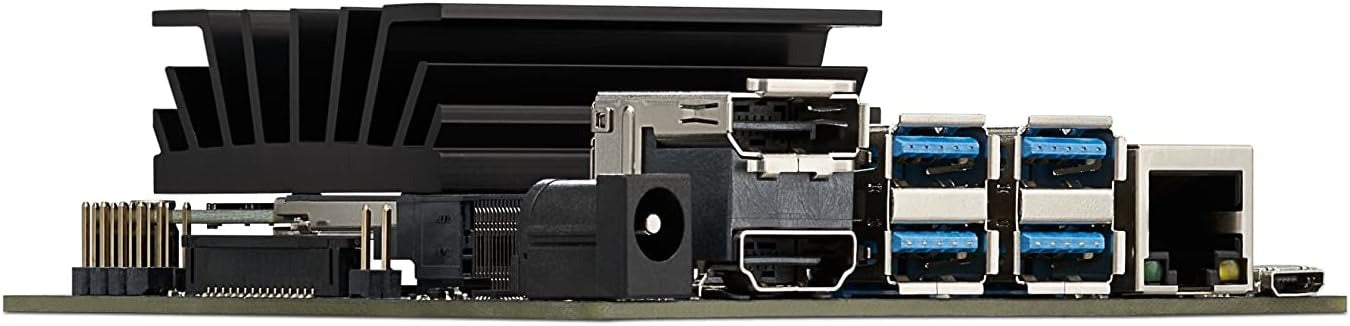 Buy Nvidia Jetson Nano 4GB Developer Kit B01 - a black heatsink, a DC power jack, HDMI, DisplayPort, four USB ports, and an Ethernet port.