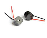 Buzzer Alarm Active Piezo Electronic Wires DC 3‑12V - shown as two small black cylindrical components with attached red and black wires.