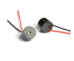 Buzzer Alarm Active Piezo Electronic Wires DC 3‑12V - shown as two small black cylindrical components with attached red and black wires.
