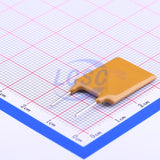 C135417 A30-600 Fuse - A Fuse For Your Valuable - a flat, tan-coloured rectangular electronic component with two metal leads, positioned on a grid-marked surface.