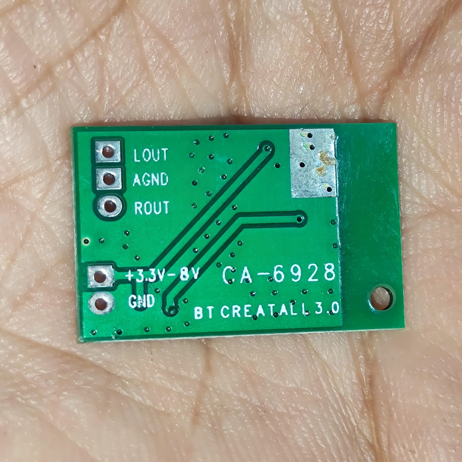Ca-6928 Bluetooth Stereo Audio Receiver Module Ca-6928 Bluetooth Stereo Audio Module For Mini Amplifier Board 3.5V~5V - a small green rectangular circuit board showing labeled solder pads for LOUT, AGND, ROUT, 3.3V-8V, and GND.