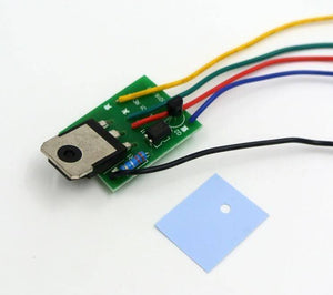 Ca 901 Switching Power Supply Repairing Module SSH7N90 - shown as a green circuit board with a large transistor, wires, and a blue thermal pad accessory.