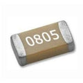 Capacitor 10uF SMD 0805 10uF 50V - shown as a close-up of a small, rectangular, tan-colored surface-mount component with the number 0805 printed on it.