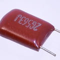 Capacitor 56nF 400V ±5% CL11 (2G563J) - High Voltage Polyester Film Capacitor - a rectangular, reddish-brown polyester film capacitor with two metal wire leads extending from one side.