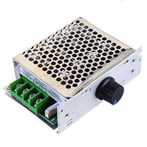 Ccm6ds PWM DC Motor Governor 12V 24V 36V 30A DC Motor Speed Controller - a silver metal box with a black rotary knob, a perforated top cover, and a green four-terminal screw connector block.