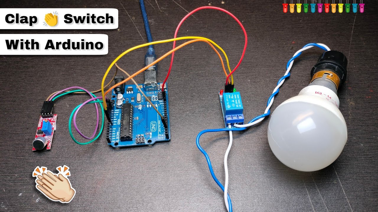 Clap Switch Using Arduino Uno | Parts Only - a blue Arduino Uno connected to a sound sensor module and a relay module, which is wired to a white light bulb.