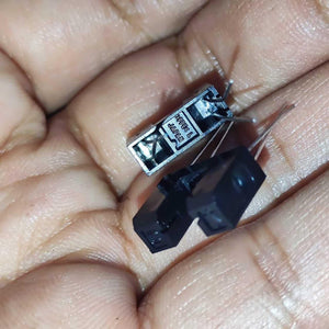 CNA1015 Japan IR u Type Sensor IR Sensor Slot Sensor IR Cut Sensor Photo Interrupter - a close-up showing two black U-shaped photo interrupters held in a hand, with Japan and model markings visible on one.