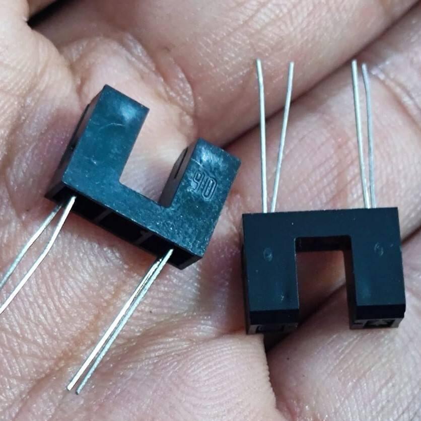 CNA1015 Japan IR u Type Sensor IR Sensor Slot Sensor IR Cut Sensor Photo Interrupter - two black U-shaped photo interrupters with four metal pins each, held in a hand.