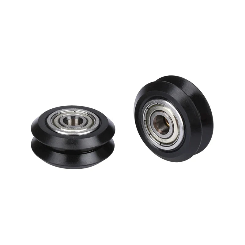 CNC V-slot Bearing Openbuilds Wheel Pom MR105ZZ 625ZZ Bore 5mm Passive Round Gear - two black V-groove wheels with central metal ball bearings positioned side-by-side against a white background.