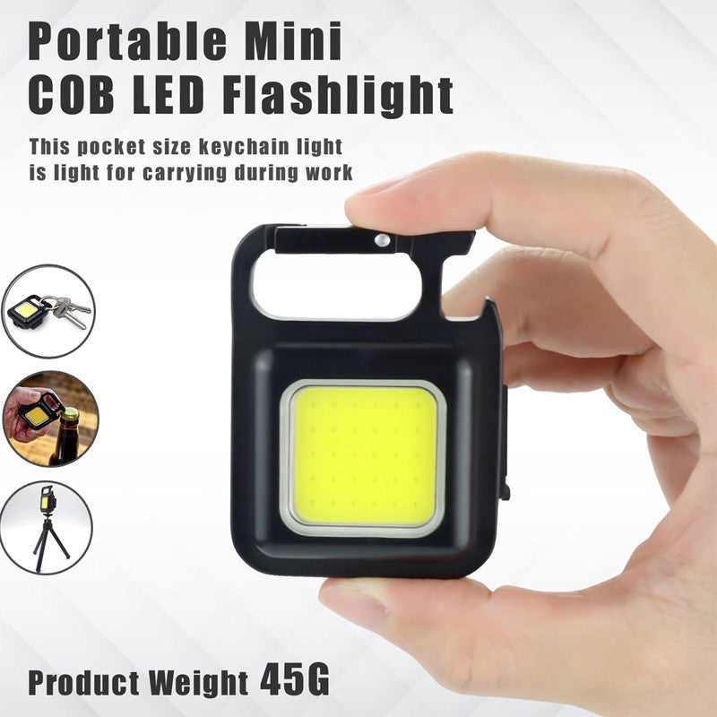 COB Rechargeable Keychain Flashlight | Mini Small Flashlight With 3 Light Modes, Folding Bracket, Bottle Opener, And Magnet Base For Fishing, Walking, - a black square keychain light with a carabiner and bottle opener, held in a hand with circular inset usage examples.