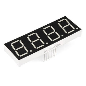 Common Anode 4 Digit 7 Segment Red LED Display - shown as a rectangular module with four numeric segments and a row of connection pins at the bottom.