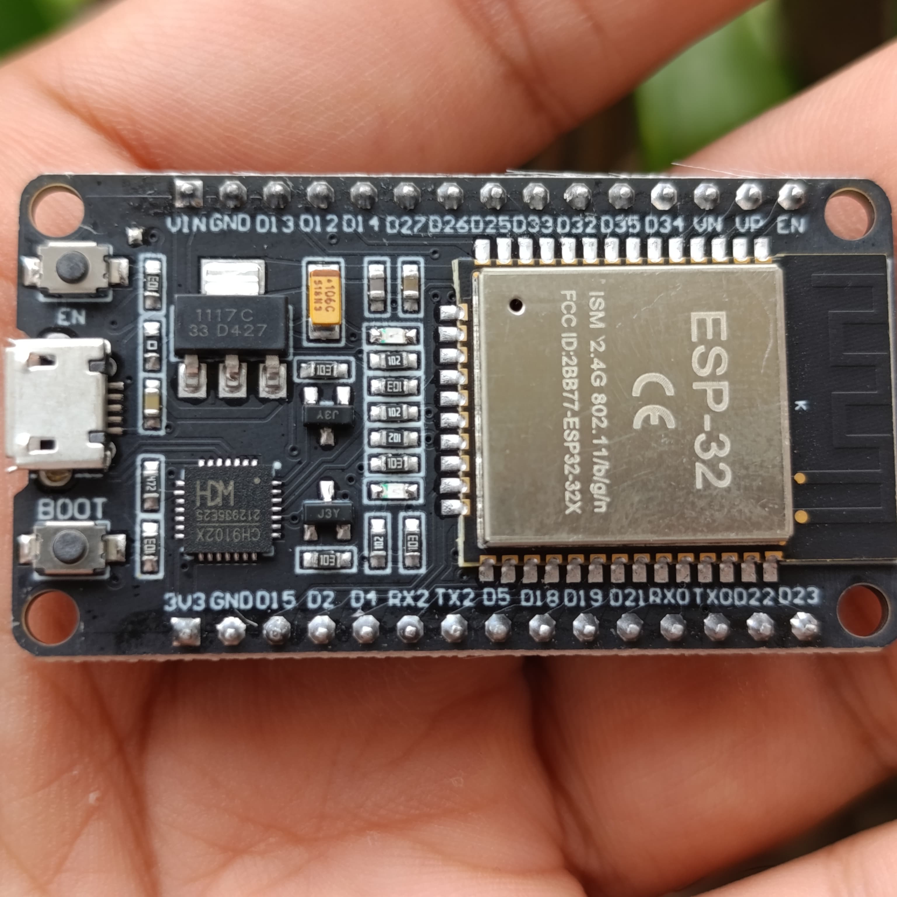 Compatible Wroom ESP32 WiFi Based Microcontroller Development Board Nodemcu CH9102X - a black rectangular circuit board with a micro-USB port and two buttons.