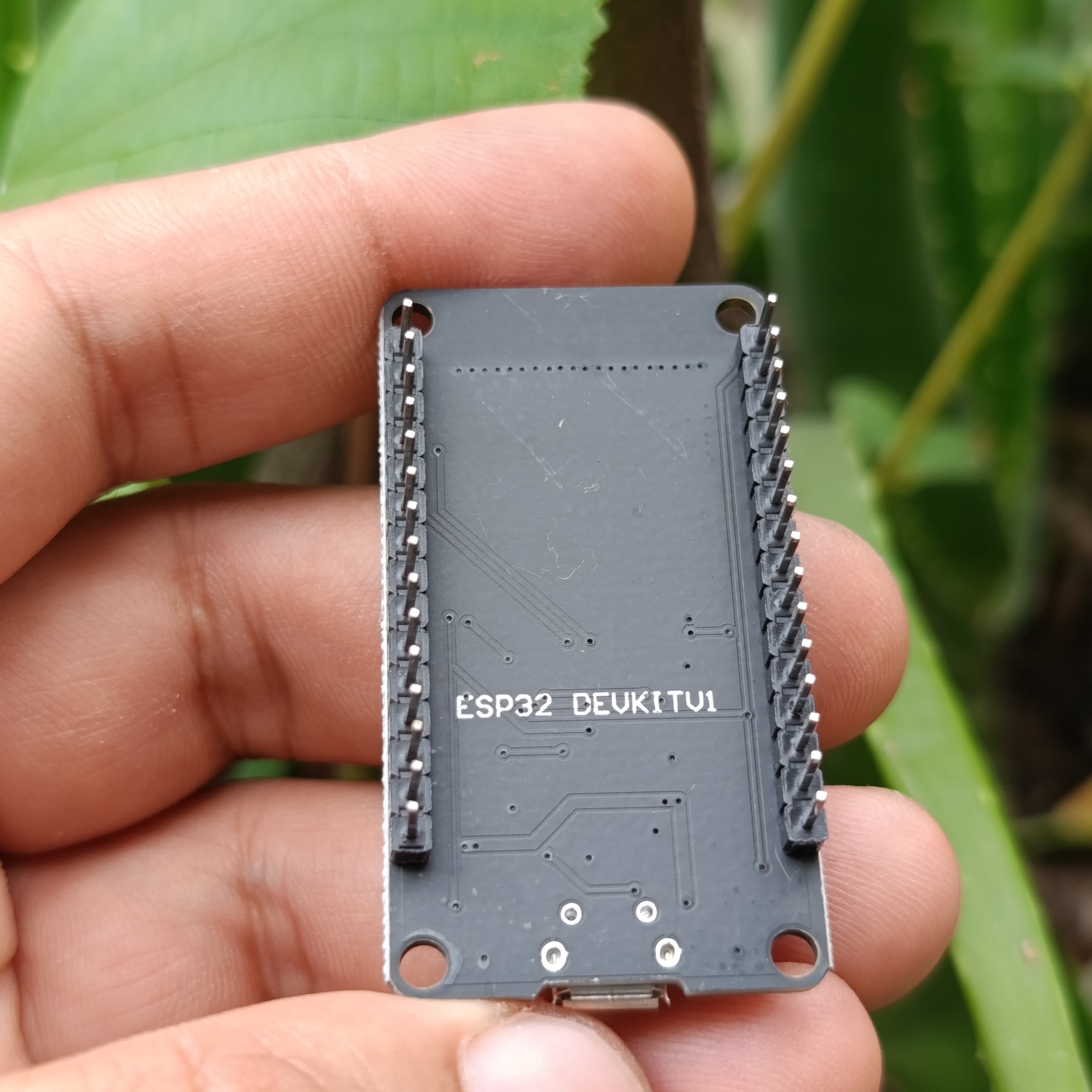 Compatible Wroom ESP32 WiFi Based Microcontroller Development Board Nodemcu CH9102X - the black underside with header pins and a USB port.