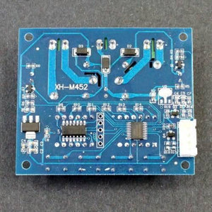Copy / Fake Incubator Temperature Humidity Controller DC 12V Xh M452 - the blue rectangular circuit board from the back, featuring integrated circuits, surface-mount components, and a white port.