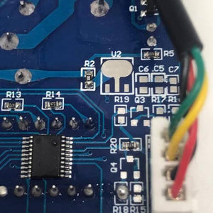 Copy / Fake Incubator Temperature Humidity Controller DC 12V Xh M452 - Copy / Fake Incubator Temperature Humidity Controller DC 12V Xh M452 close-up of the blue printed circuit board showing components, traces, and a connector.