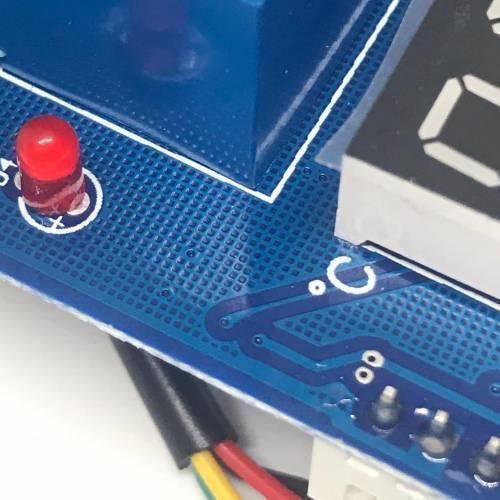 Copy / Fake Incubator Temperature Humidity Controller DC 12V Xh M452 - a blue relay, a red LED indicator, and a segment display.