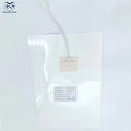 Customizable 300*400mm Bathroom Mirror Heating Pad Pet Electronic Defogger Film For Smart Mirror 220V Factory Direct - a rectangular white film with a central power connector and a product specification label.