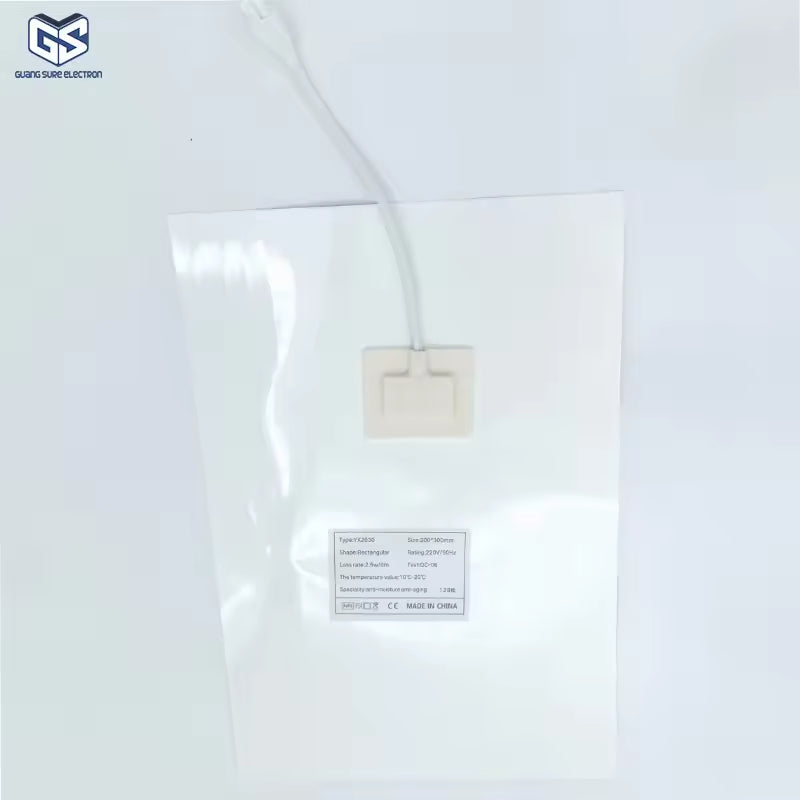 Customizable 300*400mm Bathroom Mirror Heating Pad Pet Electronic Defogger Film For Smart Mirror 220V Factory Direct - a rectangular white film with a central power connector and a product specification label.