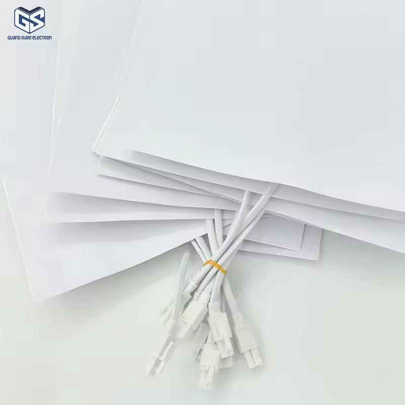 Customizable 300*400mm Bathroom Mirror Heating Pad Pet Electronic Defogger Film For Smart Mirror 220V Factory Direct - stack of white rectangular defogger films with white electrical cables and connectors.