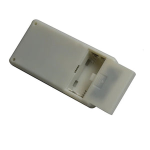 D2260 Professional Integrated Circuit IC Tester Transistor Tester Online Maintenance Digital LED Transistor IC Tester - the back of the white plastic device with its battery compartment cover partially open.
