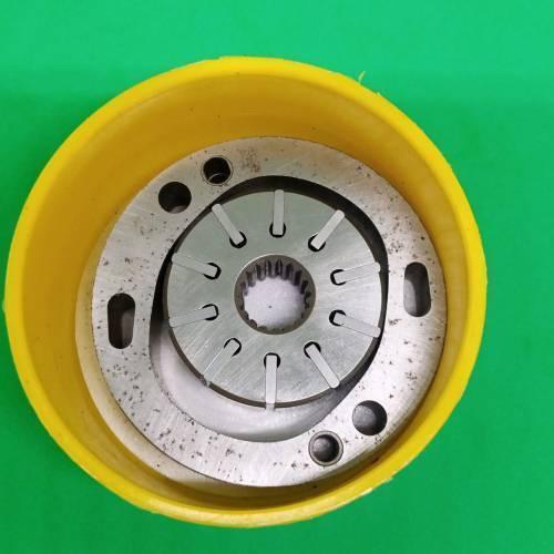Danny Pump Cartridge 34079623001 - a metallic vane pump cartridge assembly with a central splined hole, housed inside a yellow circular casing.