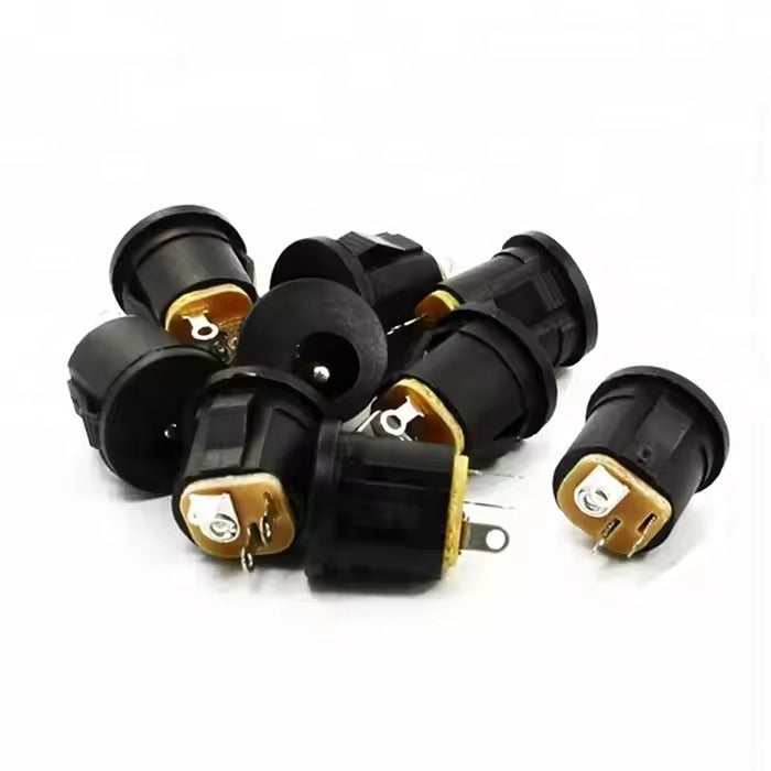 DC-022 DC Power Female Jack Connector 5.5mm X 2.1mm DC Socket Charging Interface Panel Mount Connector DC Snap Socket - a pile of black cylindrical panel-mount sockets with gold-toned metal terminals and circular ports.