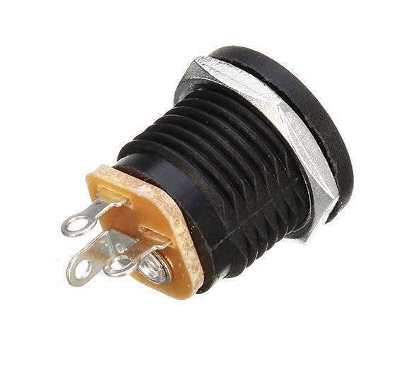 DC-022 DC Power Jack PCB Mount Female Connector 3 Pin With Nut 5.5mm x 2.1mm - a black cylindrical housing with a metal nut and three metal contact pins on a tan base.