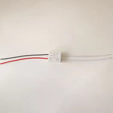 DC 12V Mini Relay Controller For Mirror Defogging Film Anti-fog Lamp On-off Control High Power 500W Contact Load - a small white rectangular module with a black and red wire on one side and two white wires on the other.