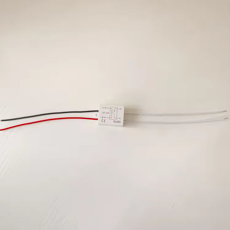 DC 12V Mini Relay Controller For Mirror Defogging Film Anti-fog Lamp On-off Control High Power 500W Contact Load - a small white rectangular module with a black and red wire on one side and two white wires on the other.