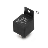 DC 24V 40A 5 Terminals Male Power Connector Relay - a black cubic electronic relay with a mounting bracket and printed wiring diagram on its side.