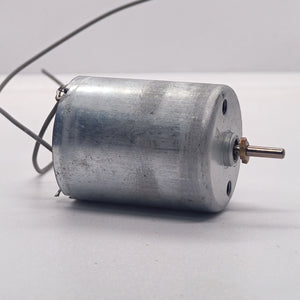 DC 2V To 24V 5100 RPM High Torque Mini Micro Motor DC Motor - a silver cylindrical DC motor with a small metal shaft and two thin wire leads attached to the back.