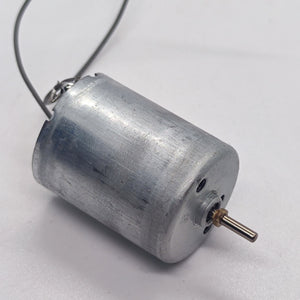 DC 2V To 24V 5100 RPM High Torque Mini Micro Motor DC Motor - a silver cylindrical DC motor with a small metal shaft and two attached grey electrical wires.