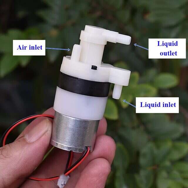 DC 3V-3.7V Pump - a white plastic pump head with labeled air inlet, liquid inlet, and liquid outlet ports attached to a cylindrical metal motor.