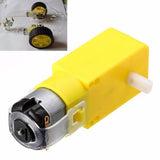 DC 3V 6V DC Gear Motors - shown as a yellow plastic-encased motor with a white output shaft and a metallic motor housing, with an inset showing a robot base.