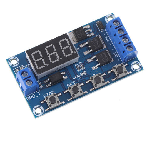 DC 5-30V Dual Mos LED Digital Time Delay Relay Switch Module Circuit Board - a blue circuit board with a three-digit display, four buttons, and terminal blocks.