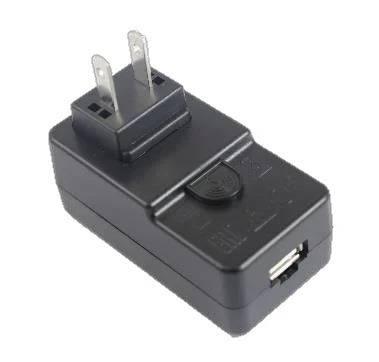 DC 5V 2A Or 2.5A Or 3A 100-240VAC - a black, rectangular wall-plug unit featuring a single USB port and a small circular button.