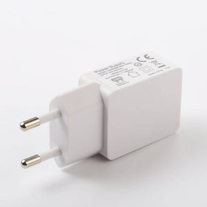 DC 5V 2A Or 2.5A Or 3A 100-240VAC - a white, rectangular wall adapter with two round prongs and a USB port on the side.