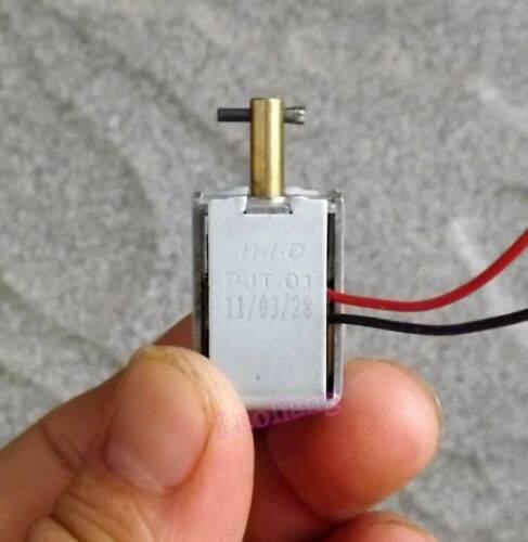 DC 6-12V Bidirectional Self-retaining Solenoid Push Pull Electromagnet PJT-01D - a rectangular metal component with a brass shaft and red and black wires.