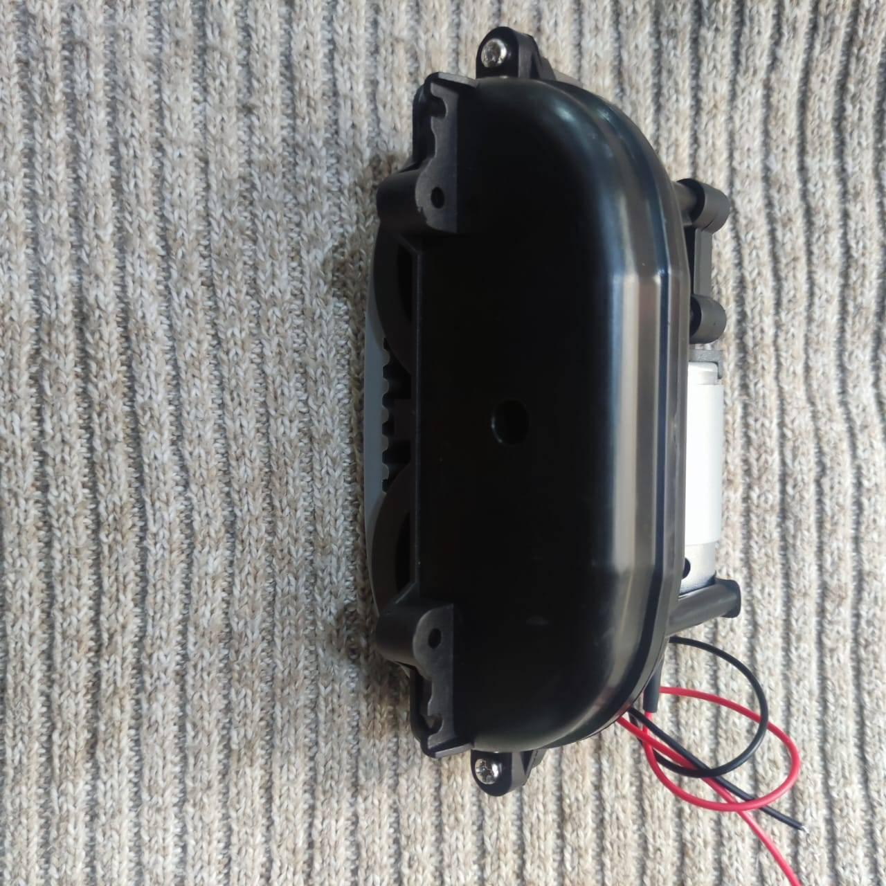 DC Gear Motor With 3.7V To 12V Operated - shown as a black plastic-encased gear motor unit with an attached silver motor and red and black power wires.