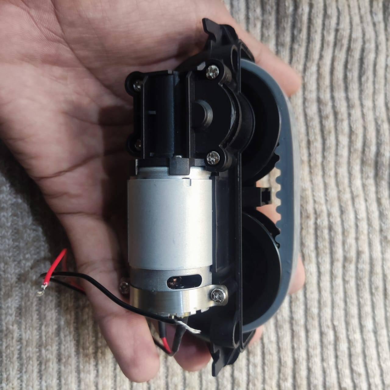 DC Gear Motor With 3.7V To 12V Operated - shown as a silver cylindrical motor attached to a black plastic gear assembly with red and black power wires.
