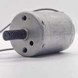 DC Motor 2V To 24V 5100RPM - a silver cylindrical DC motor with a black plastic worm gear on the shaft and two wire leads extending from the back.