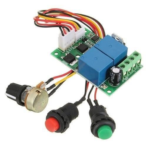 DC Motor Speed And Direction Controller Board - a green circuit board with two blue relays, a potentiometer, and red and green push buttons.