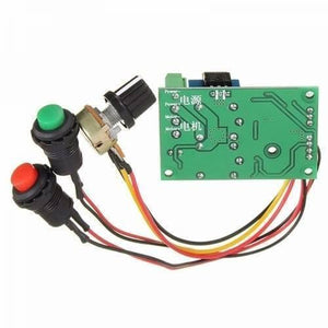 DC Motor Speed And Direction Controller Board - a green circuit board with a knob, a red button, and a green button connected by multi-coloured wires.