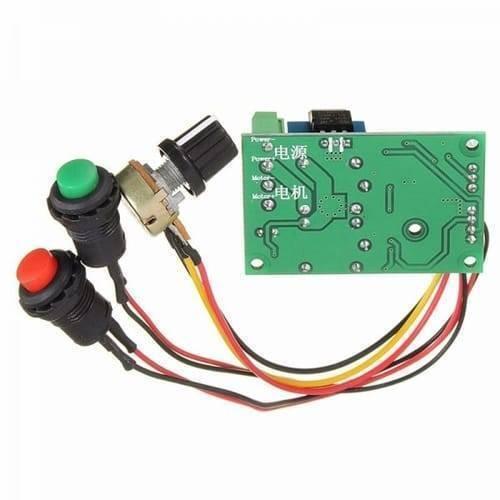 DC Motor Speed And Direction Controller Board - a green circuit board with a knob, a red button, and a green button connected by multi-coloured wires.